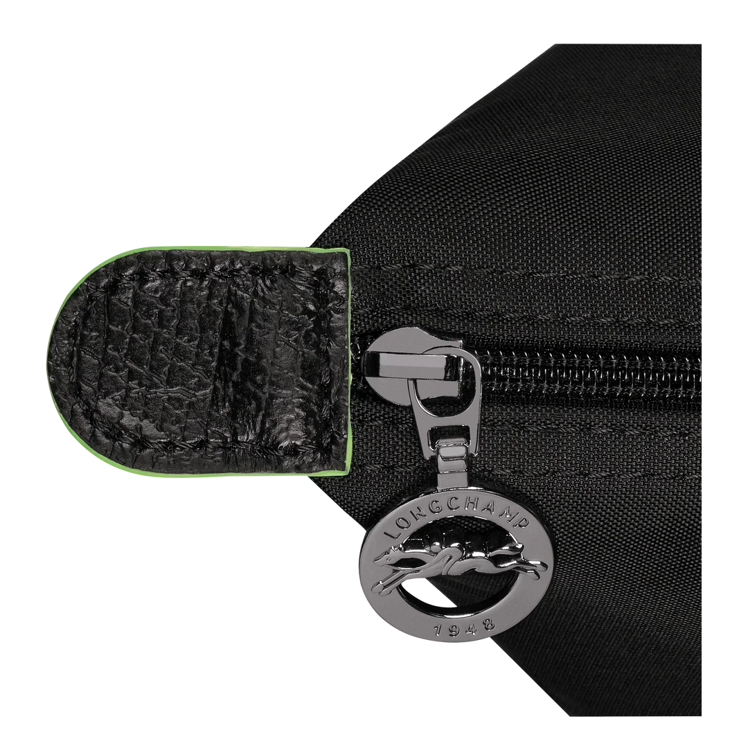 Black nylon zipper pull with metal key ring and leather-look tab