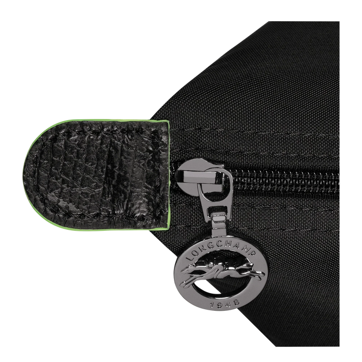 Black nylon zipper pull with metal key ring and leather-look tab