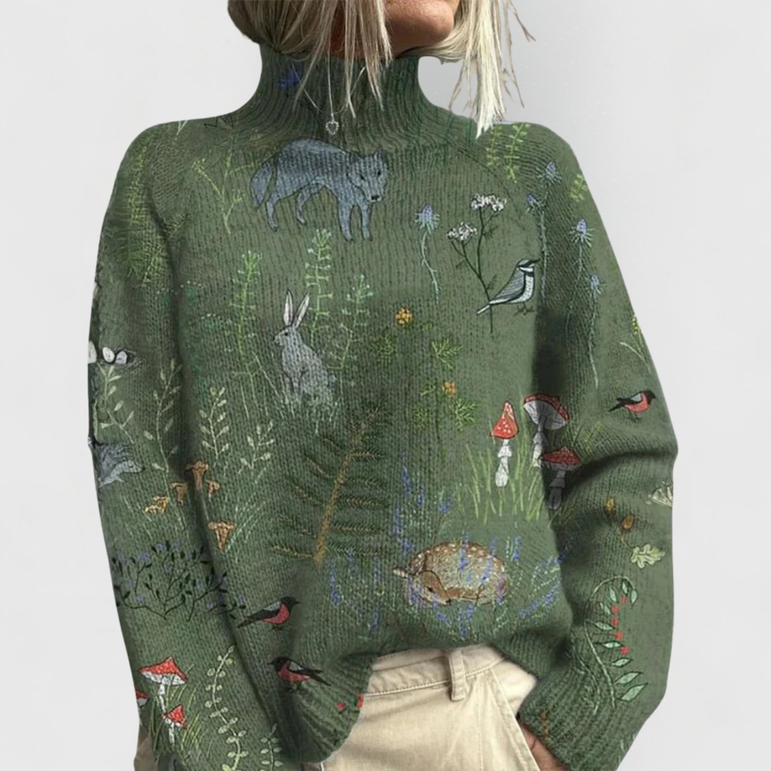 Green turtleneck sweater with woodland animal and bird graphic print all over.