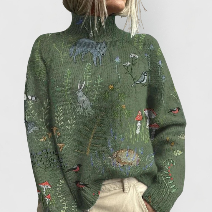 Green turtleneck sweater with woodland animal and bird graphic print all over.
