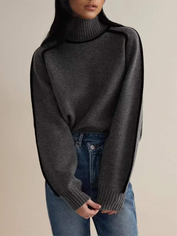 Dark gray luxe trim turtleneck sweater with ribbed cuffs and neckline