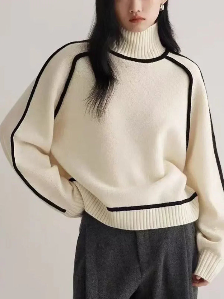 White luxe trim turtleneck sweater with black-trim bands and ribbed turtleneck