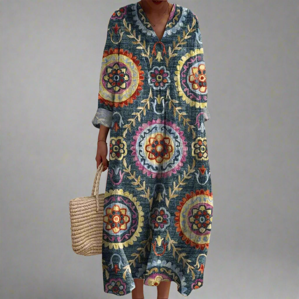 Long-sleeve geometric V-neck dress in dark blue with colorful circular medallion print