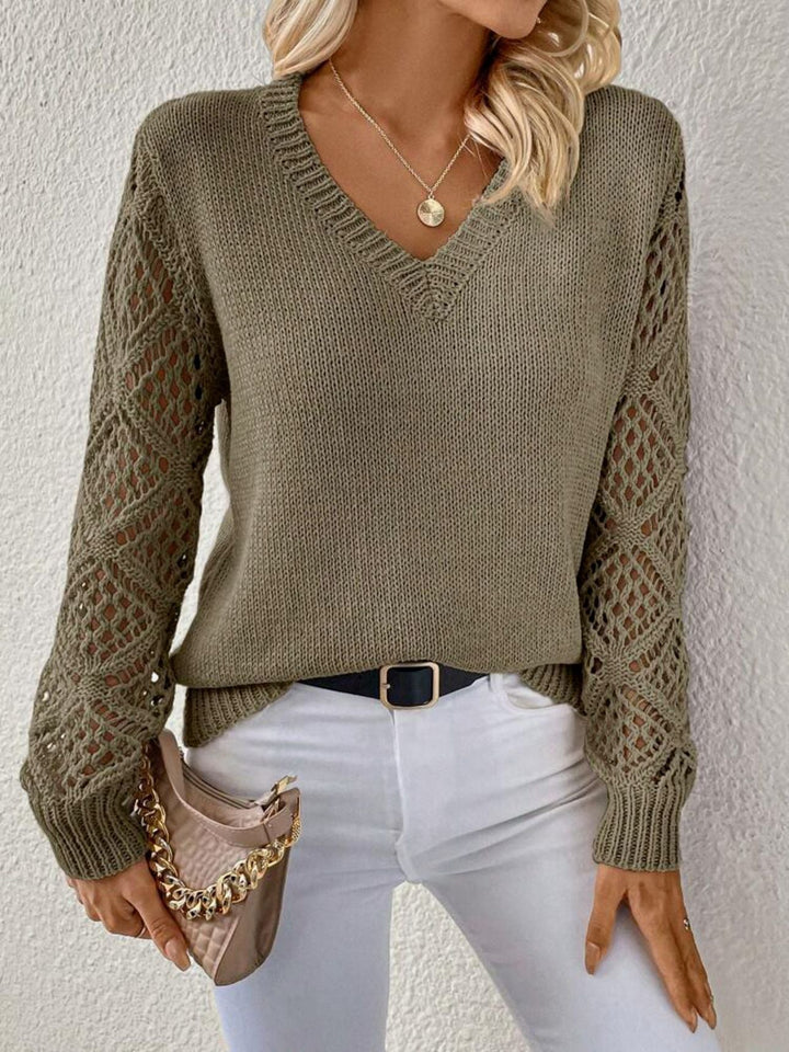 Green knit V-neck top with lace-pattern sleeves