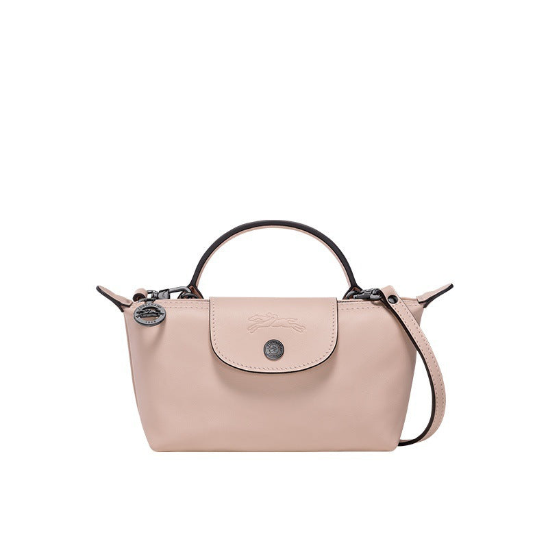 Mini leather handbag with flap front and crossbody strap, light pink