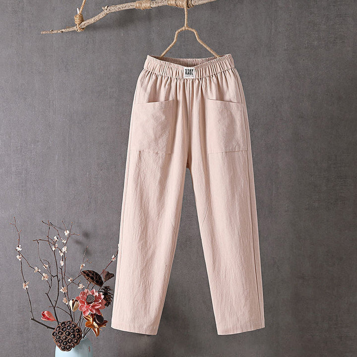Apricot relaxed pocket pants with elastic waistband and two side patch pockets.