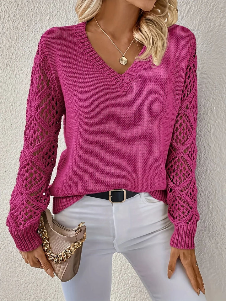 Dark pink knit V-neck top with lace-pattern sleeves