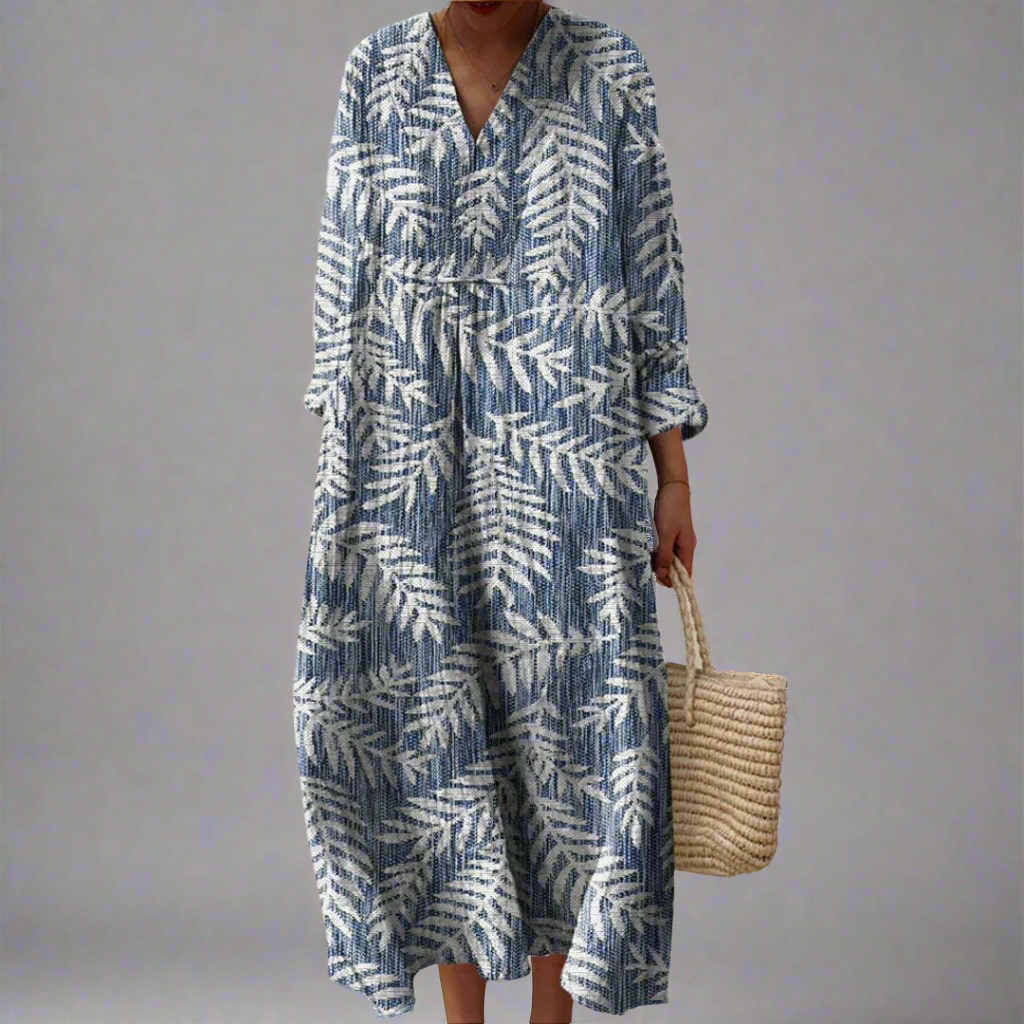 Blue and white geometric midi dress, V-neck, long sleeves, tie waist.