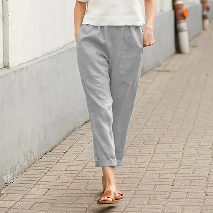 Light gray casual tapered pants, ankle length, elastic waistband, side pockets