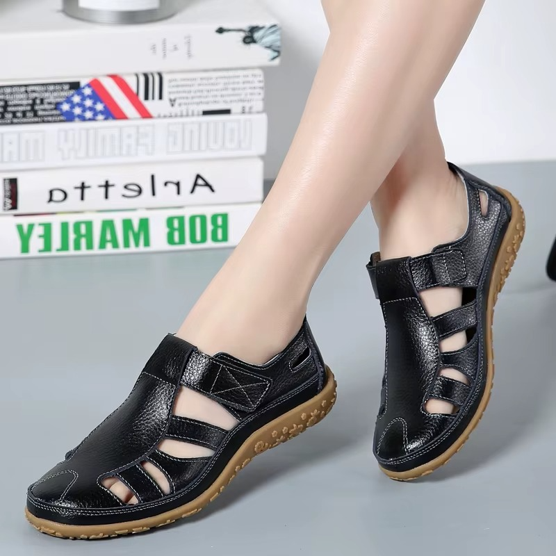 Orthopedic anti-slip sandals, black leather with side cutouts and tan anti-slip sole