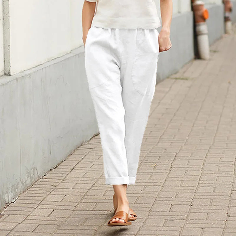 White casual tapered pants, ankle length, elastic waistband, side pockets