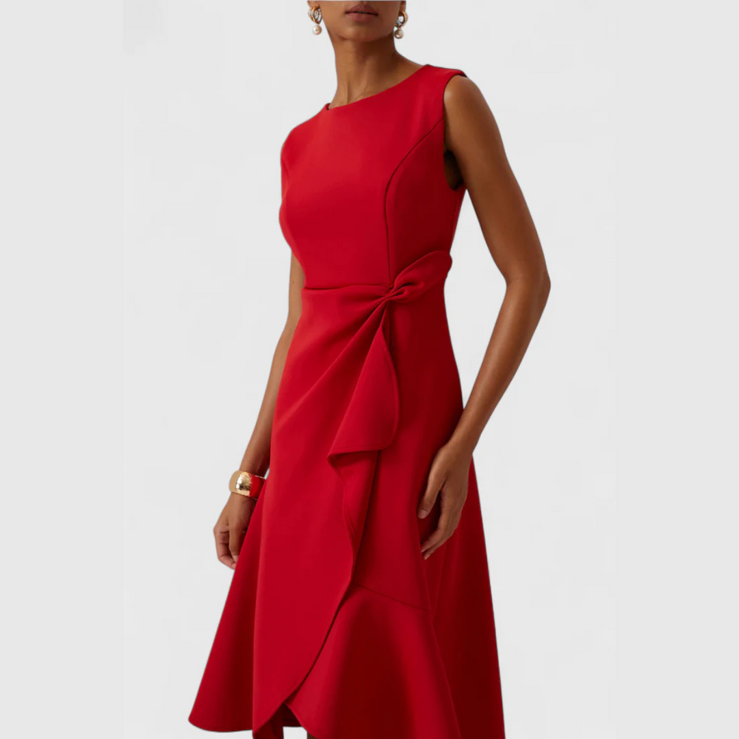 Red sleeveless midi dress with asymmetrical drape and front tie bow