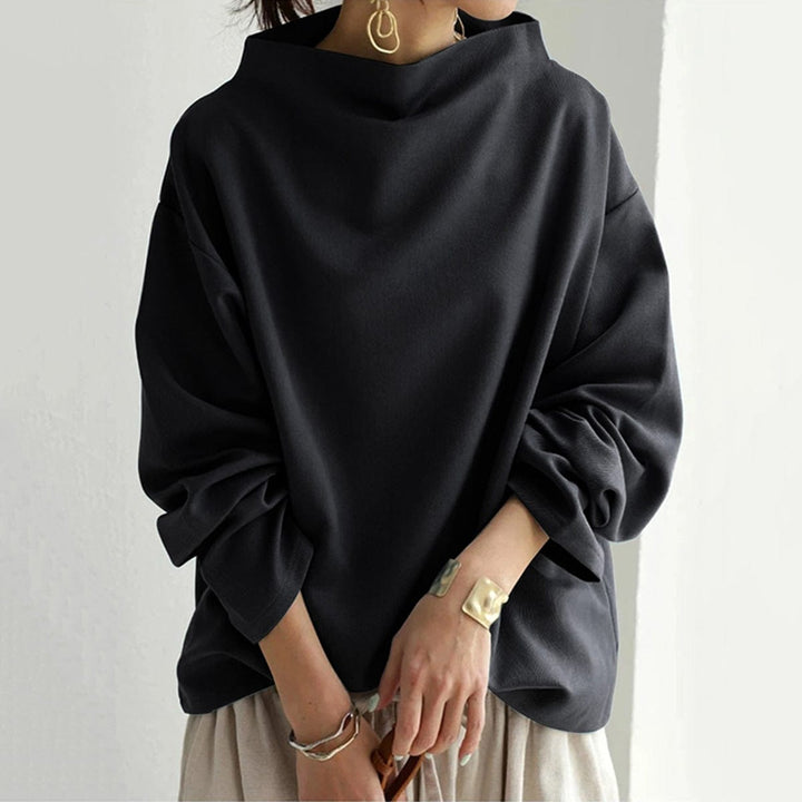 Black high-neck sweater with wide batwing sleeves and loose fit