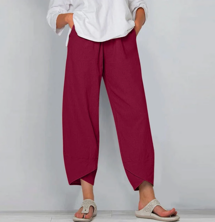 Relaxed everyday pants in red, cropped, side pockets, draped hem panels