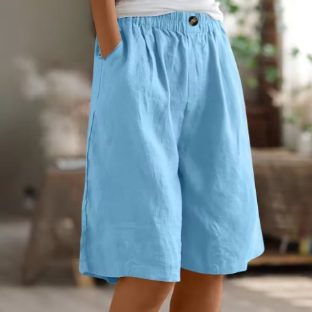 Elastic-waist mid-thigh shorts in sky blue, buttoned elastic waistband, relaxed fit