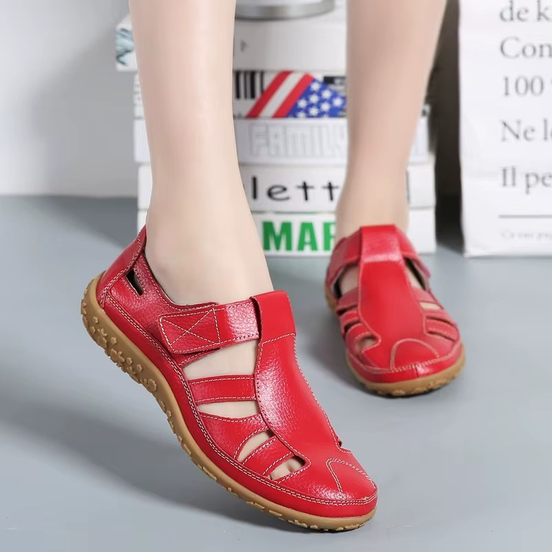 Red orthopedic anti-slip sandal with hook-and-loop straps and textured rubber sole