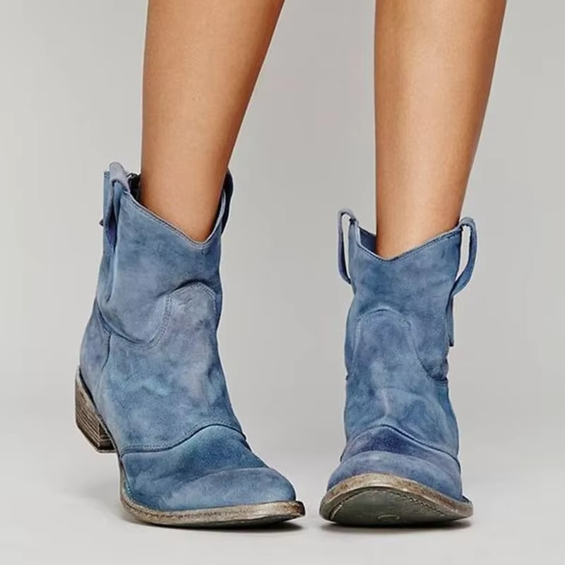 Blue suede western ankle boots with low block heel and pull tabs, pointed toe