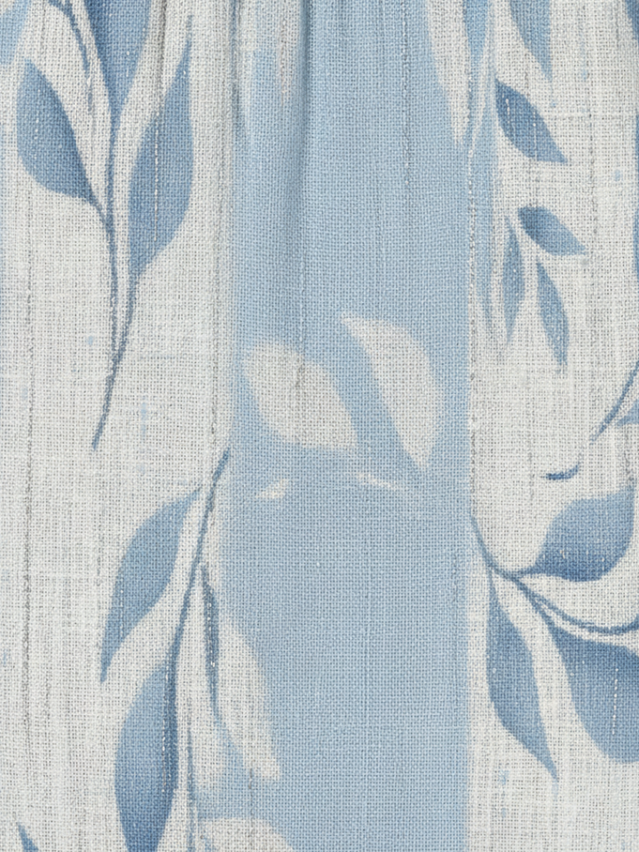 Light blue and white leaf-patterned woven fabric texture
