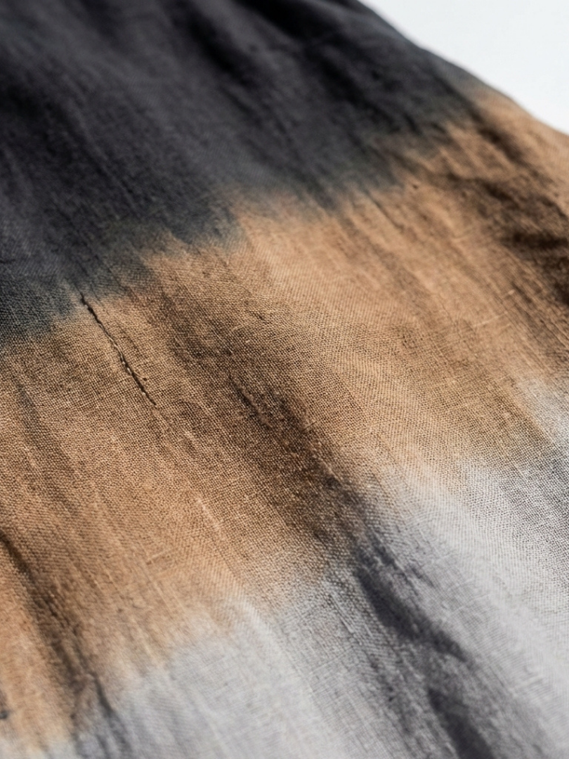 Ombre fabric for a sleeveless dress, dark charcoal blending into tan
