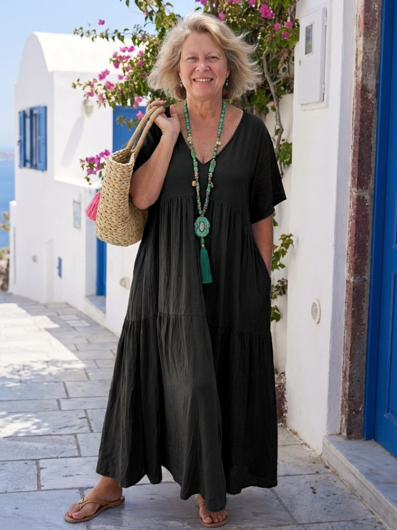Black tiered short-sleeve maxi dress with gathered bodice and layered skirt