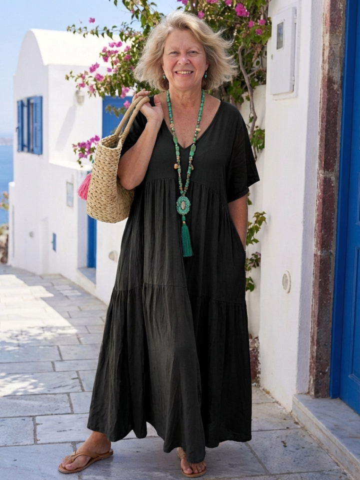 Black tiered short-sleeve maxi dress with gathered bodice and layered skirt
