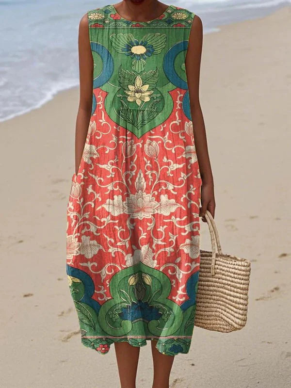 Sleeveless midi dress with multicolor floral and scroll pattern, crew neck.