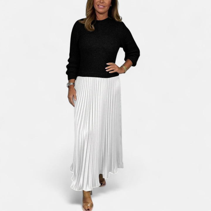 Sweater and pleated skirt set: black knit sweater with white pleated midi skirt