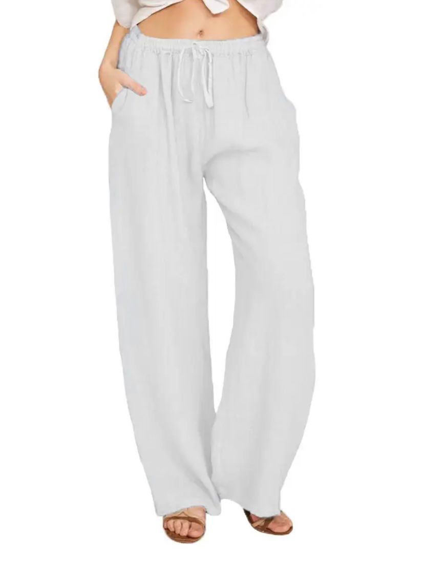 White drawstring pants with elastic waist and relaxed wide-leg fit.