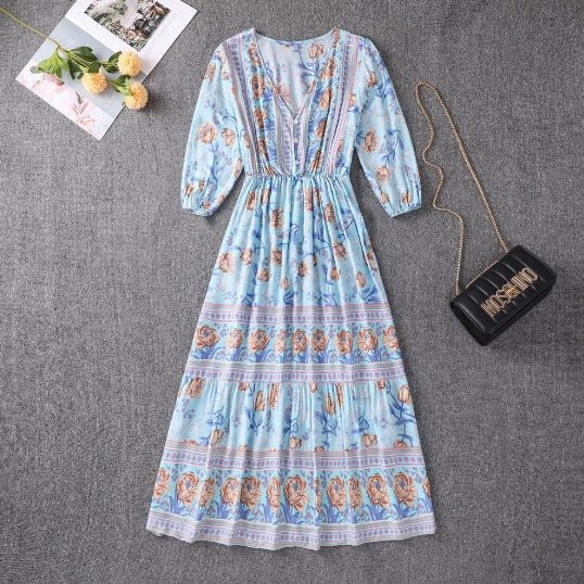 Light blue boho midi dress, long sleeves, gathered waist, border print tiers