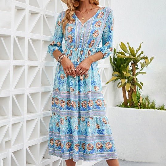 Blue floral boho midi dress with button-front V-neck and tiered skirt