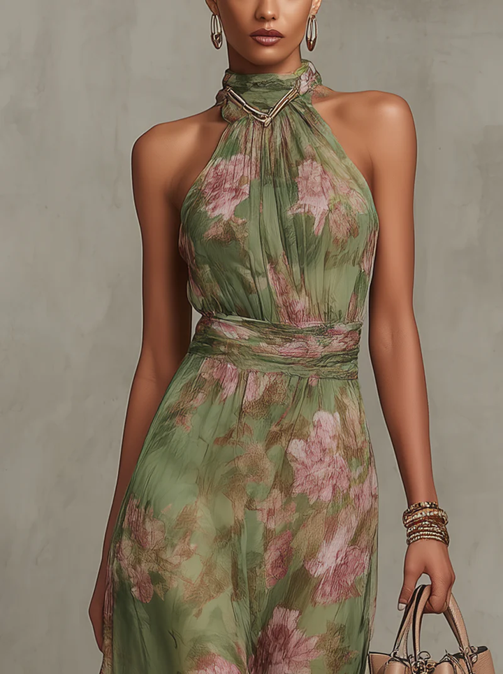 Front close-up of green floral halterneck maxi dress with smocked high neckline
