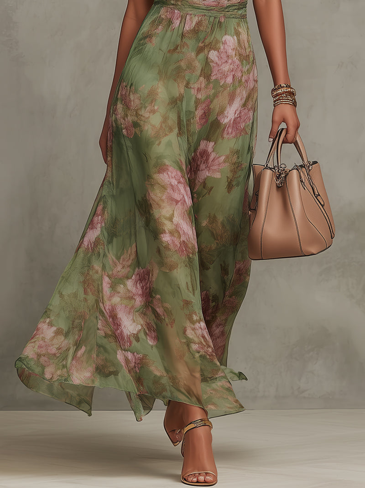 Green floral maxi dress hem with halterneck and gathered waist, flowing skirt