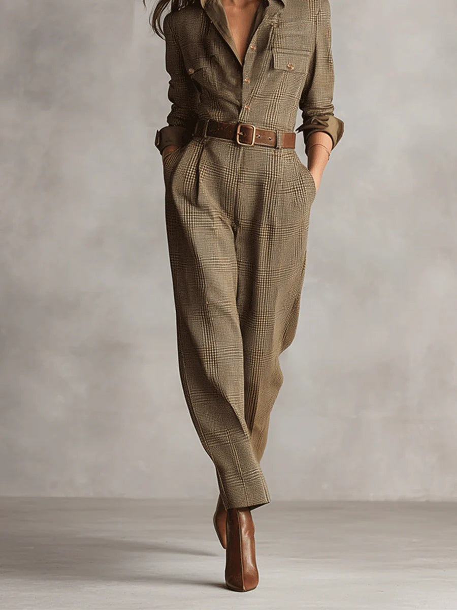 Belted plaid jumpsuit with tapered legs and brown waist belt, long sleeves