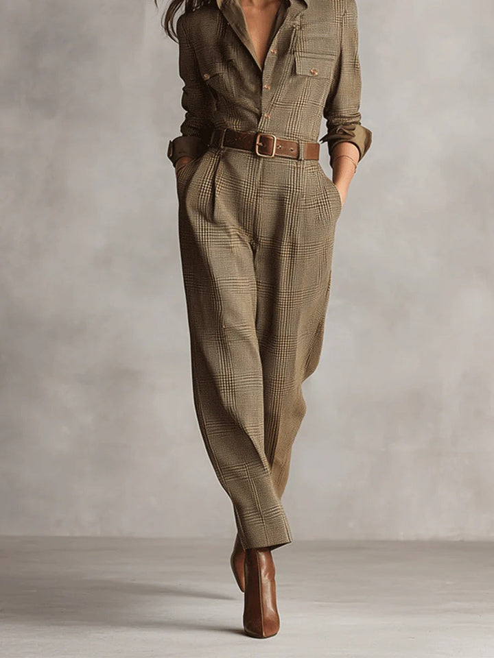 Belted plaid jumpsuit with tapered legs and brown waist belt, long sleeves