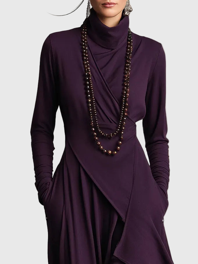 Purple draped turtleneck maxi dress with long sleeves and crossover wrap bodice