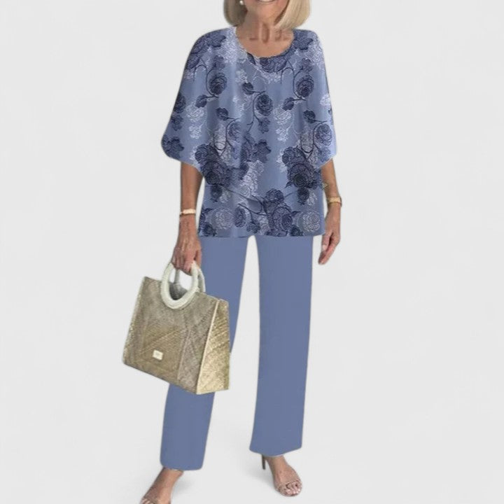 Two-piece blouse and trousers set, blue floral top and blue straight-leg pants