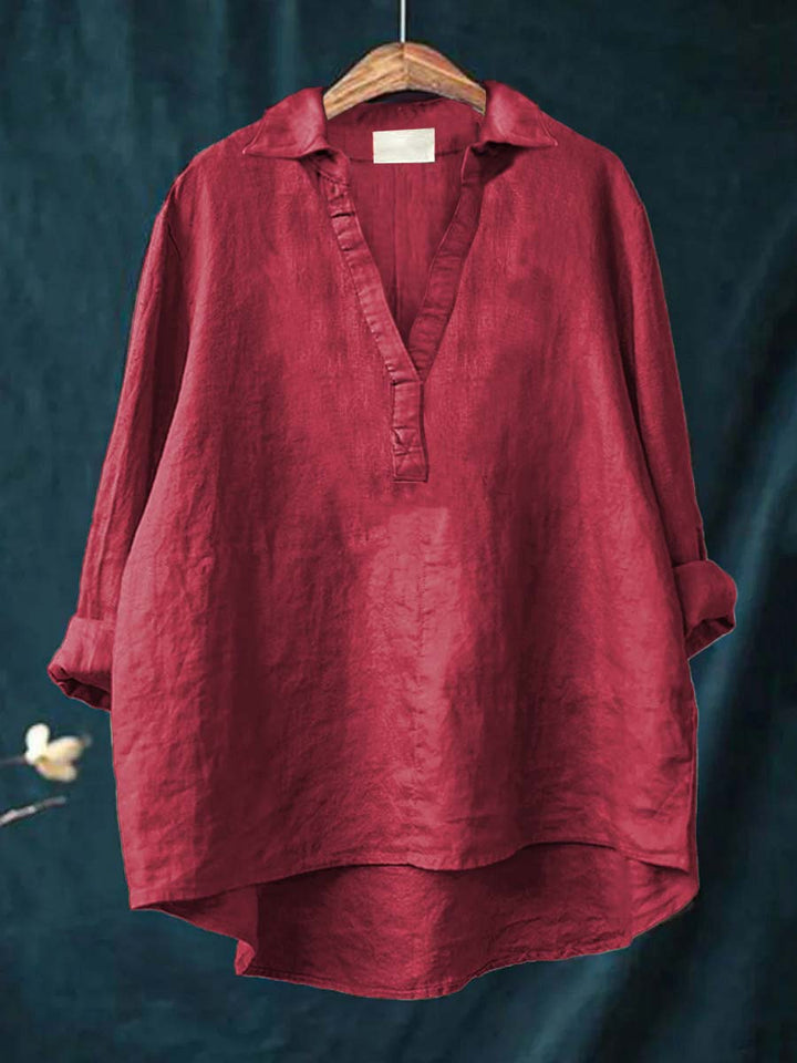Burgundy red linen blouse with V-neck and short button placket, relaxed fit