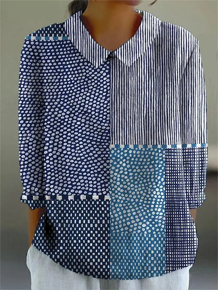 Patchwork button shirt with striped, polka-dot, and teal check panels; long sleeves.
