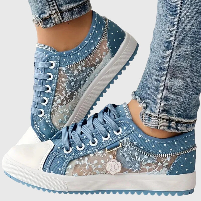 Light blue lace-up casual sneakers with star and flower print, white toe cap