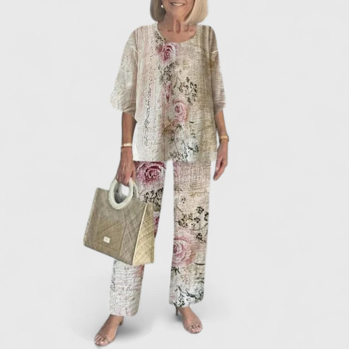 Two-piece blouse and trousers set, beige floral top and beige wide-leg trousers