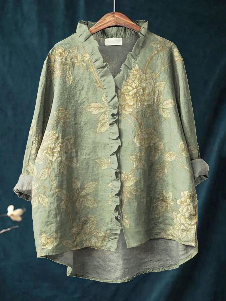 Relaxed linen blouse in sage green with floral print, ruffled V-neck and buttons