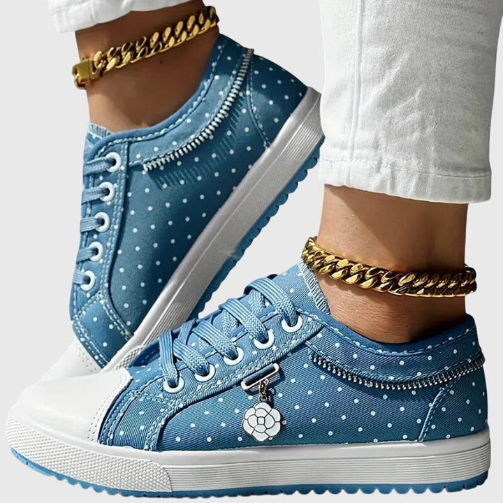 Light blue lace-up casual sneakers with white speckle dots, side zipper, and chunky sole