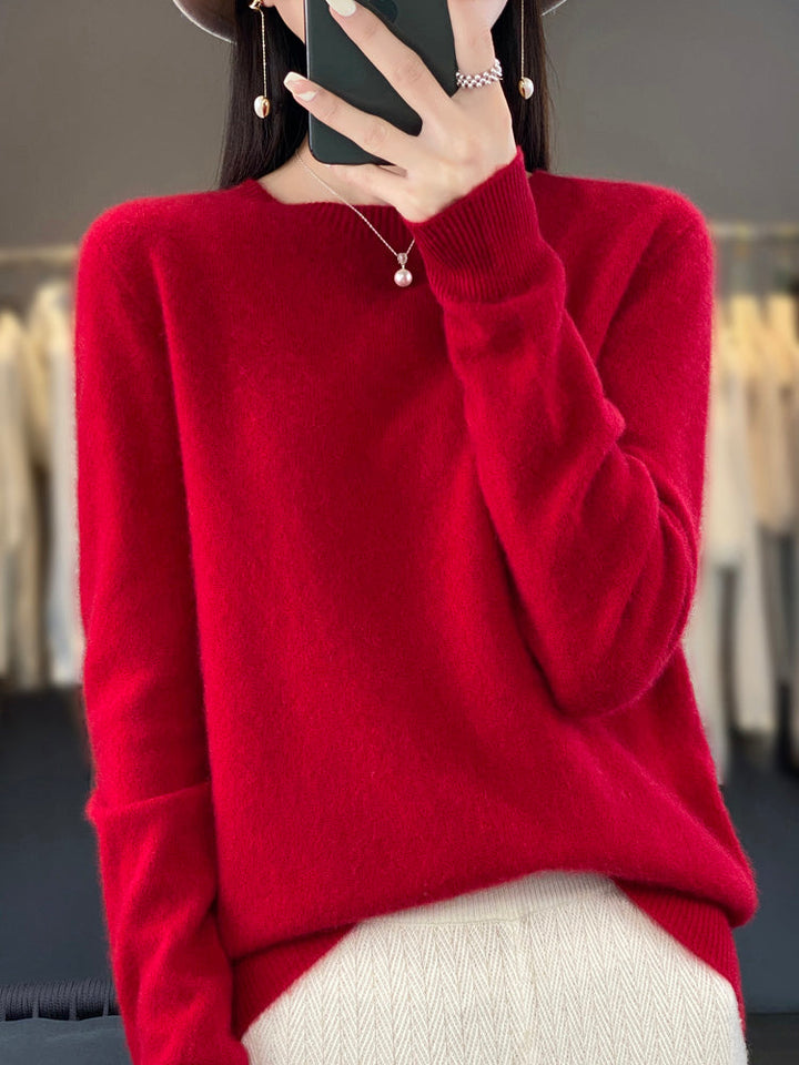 Soft knit pullover sweater in red with buttoned round neckline and long sleeves