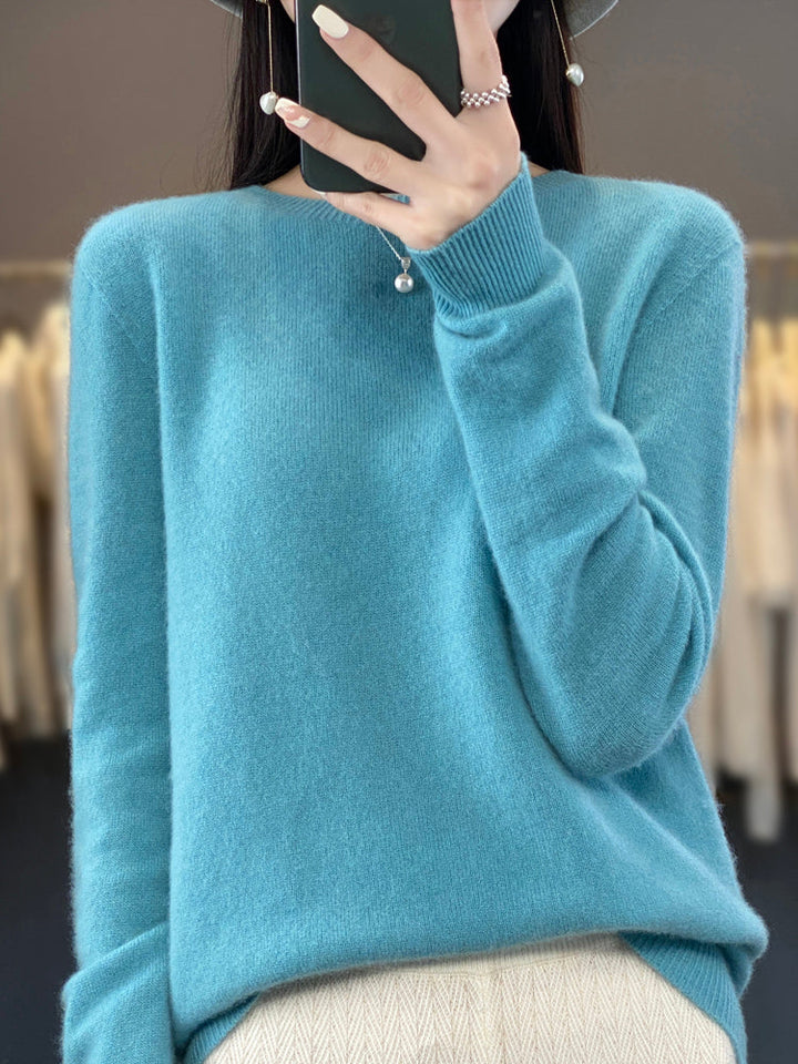 Turquoise soft knit pullover sweater with mock neck and buttoned collar, long sleeves