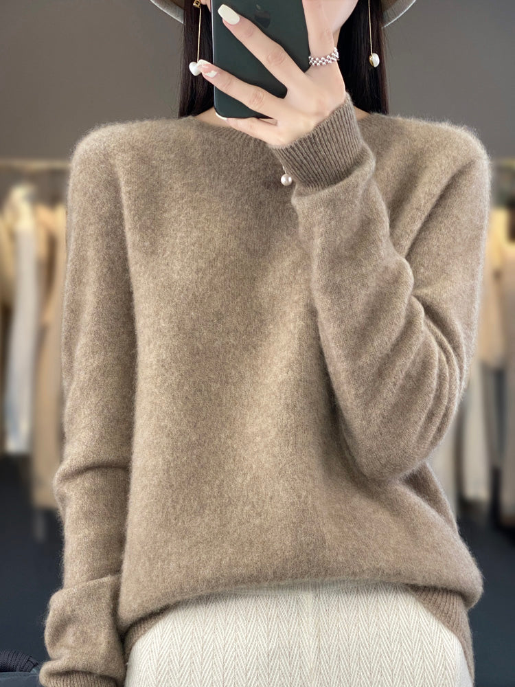 Soft knit pullover sweater in camel beige with buttoned round neckline and long sleeves