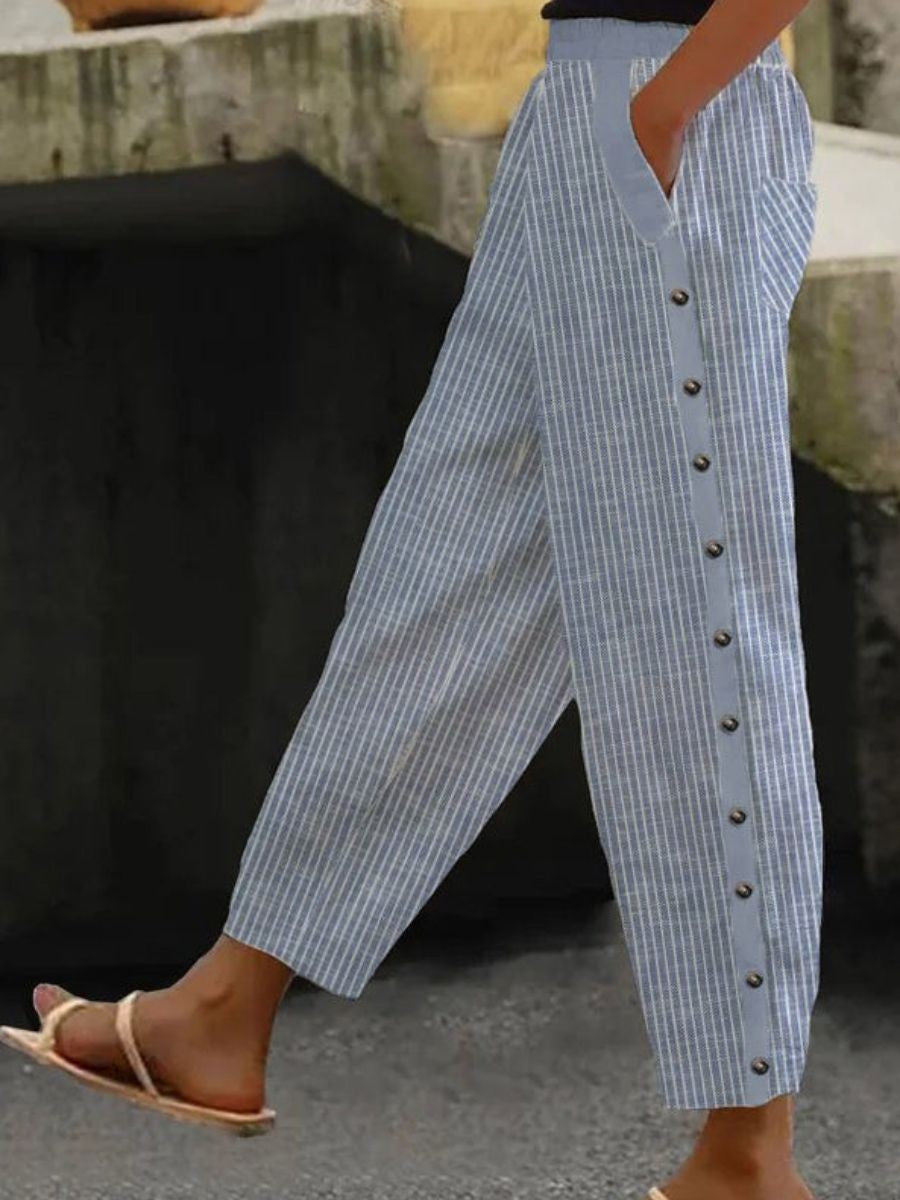 Blue pinstripe button-front pants with cuffed hems and center row of buttons