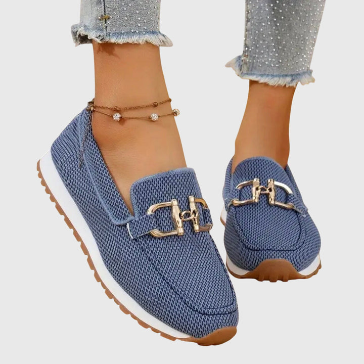 Blue chain-detail slip-on loafers with gold buckle hardware and textured upper
