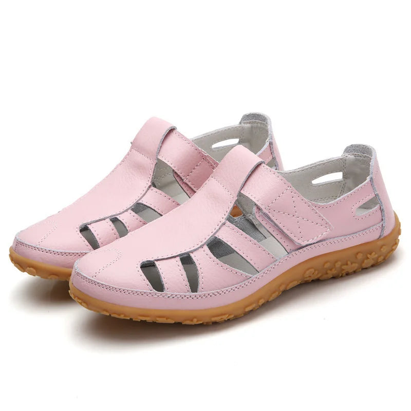 Pink orthopedic anti-slip sandal with hook-and-loop straps and textured rubber sole