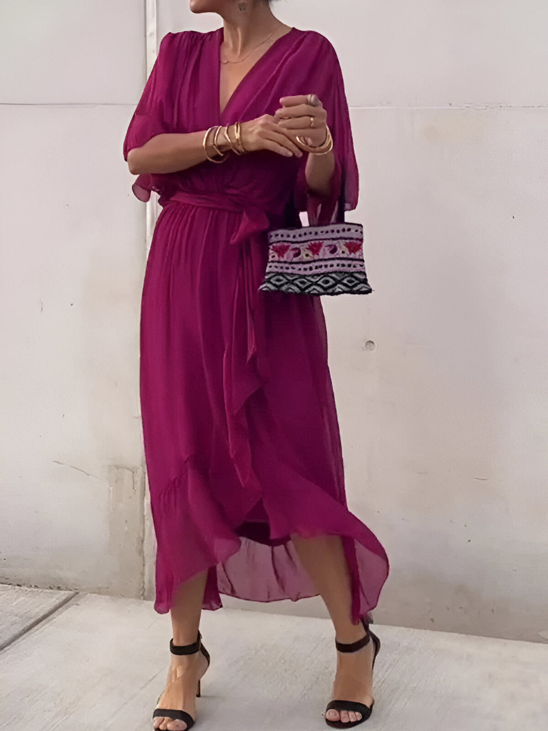 Fuchsia chiffon V-neck dress with gathered waist tie and flowing mid-calf hem