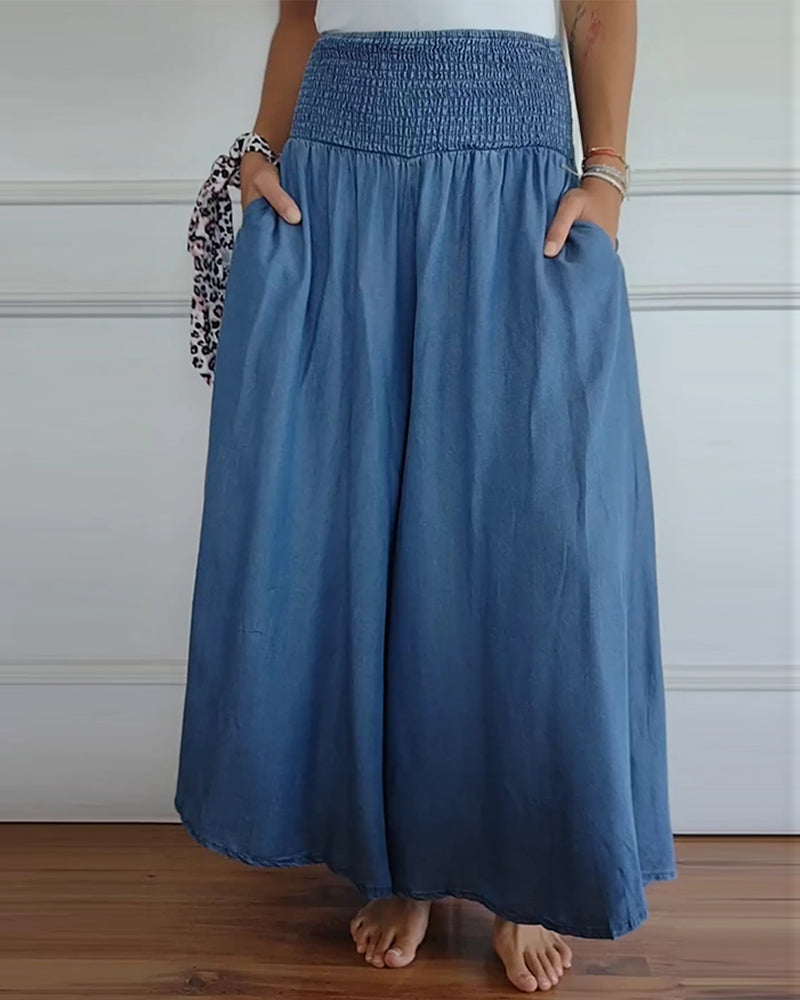 Blue flowy wide pants with elastic waistband and gathered front pleats